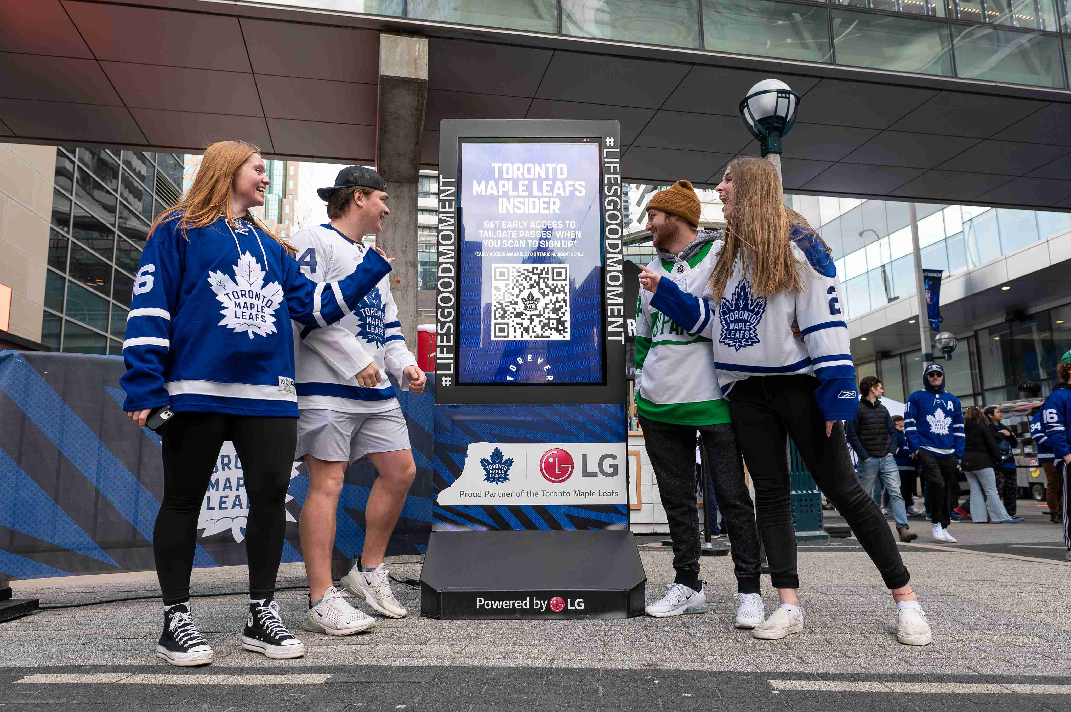 Toronto Maple Leafs Fans interacting with interactive display
